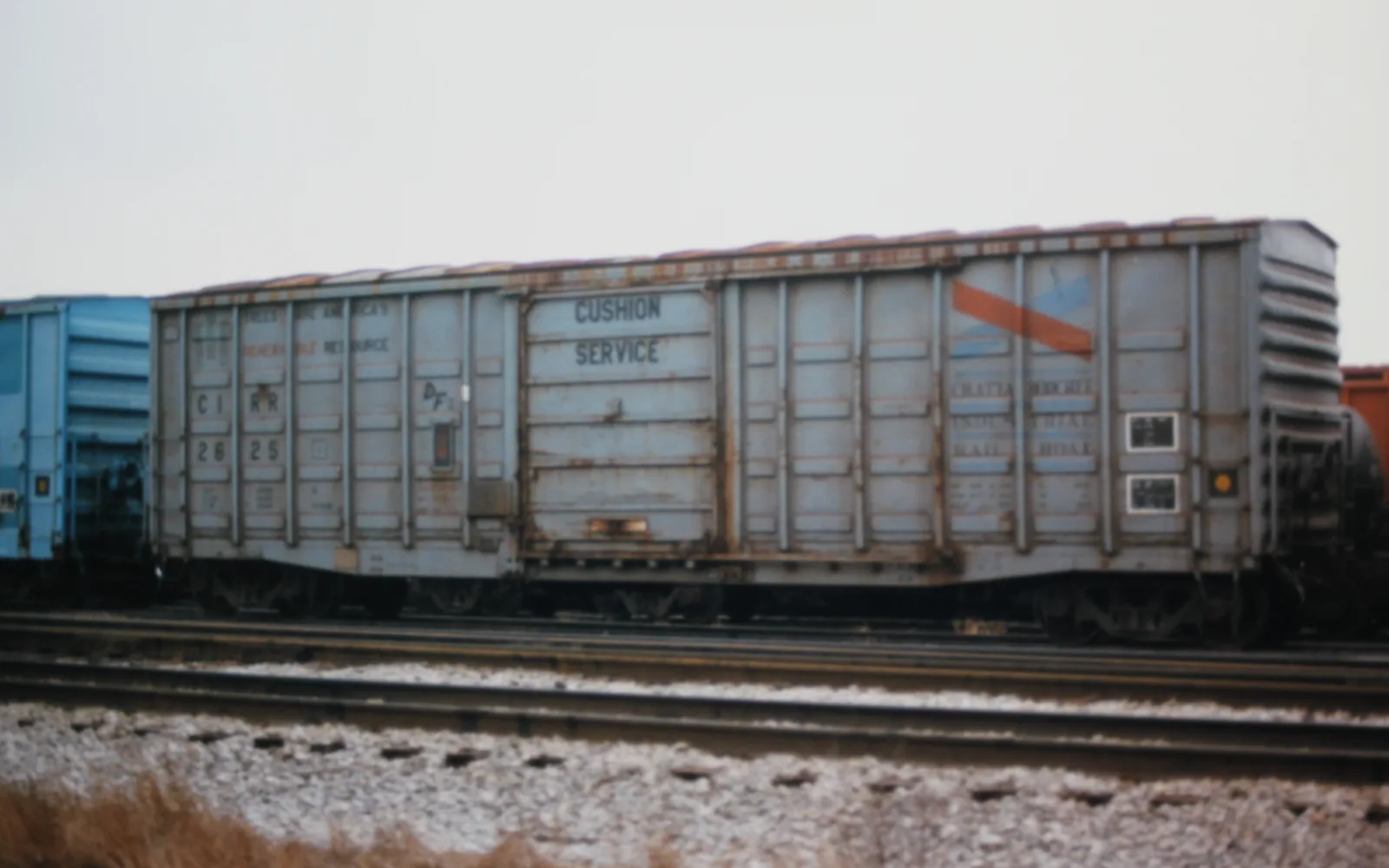 A vintage industrial railroad boxcar, representing the railway heritage and freight operations central to Colton's identity as the Hub City.